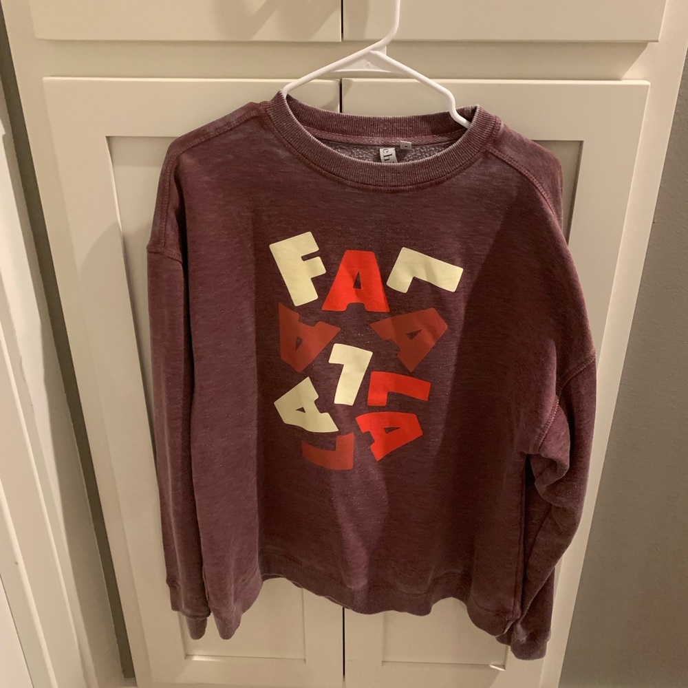 Woman’s sweatshirt.